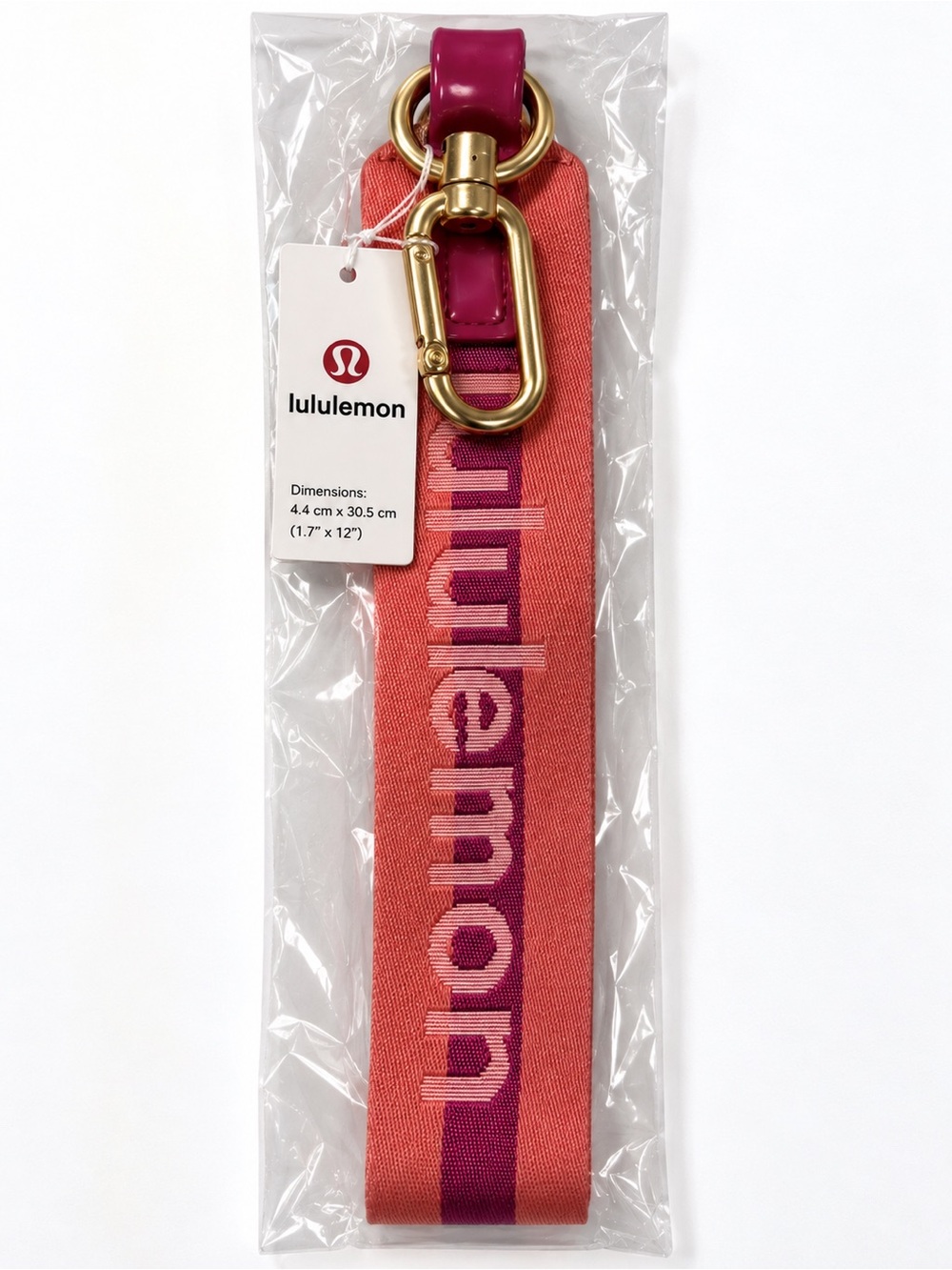 NWT lululemon Never Lost Keychain Wordmark Wristlet Coral Pink Magenta